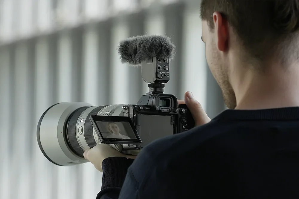 Sony Alpha series mirrorless video camera in a studio filming setup