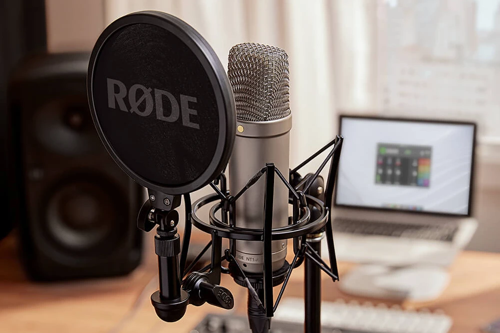 Desk-mounted microphone setup for podcasting or livestreaming