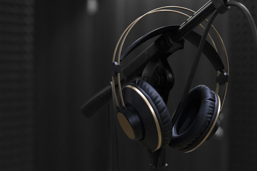 Headphones hanging up on mic stand